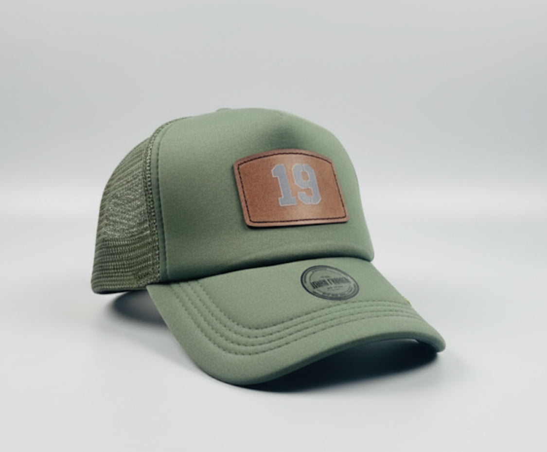 Trucker hat by John finnin high crown