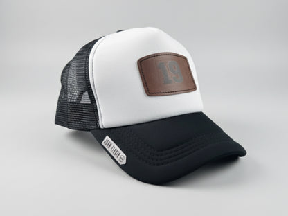 Trucker hat by John finnin high crown