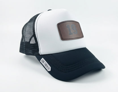 Trucker hat by John finnin high crown