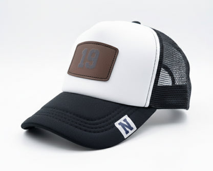 Trucker hat by John finnin high crown