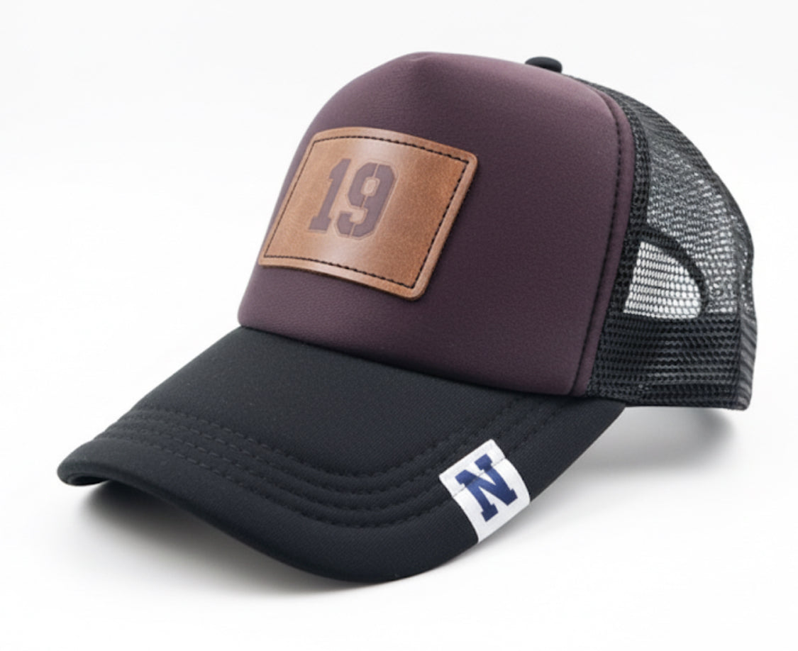 Trucker hat by John finnin high crown