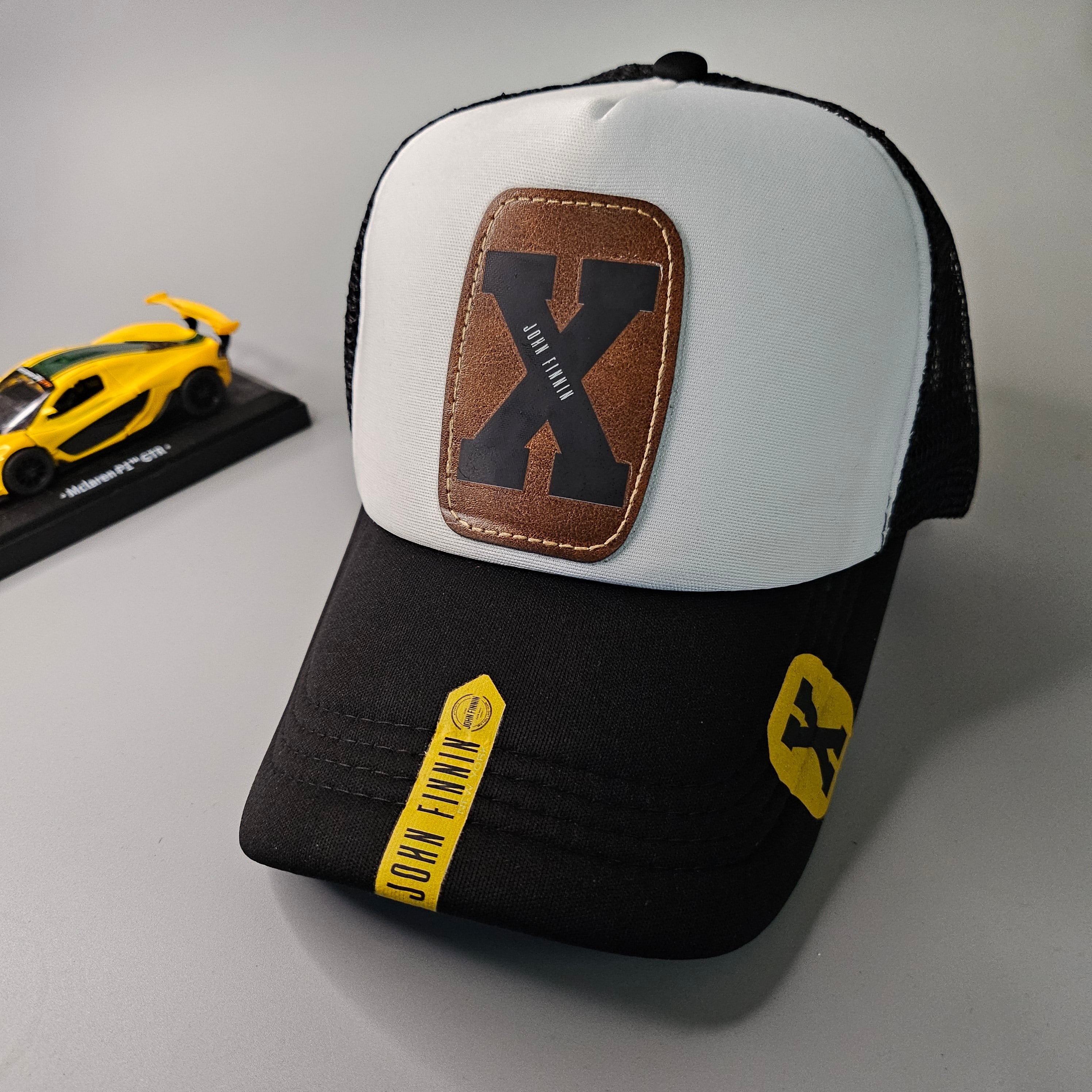 X 'JOHN FINNIN TRUCKER