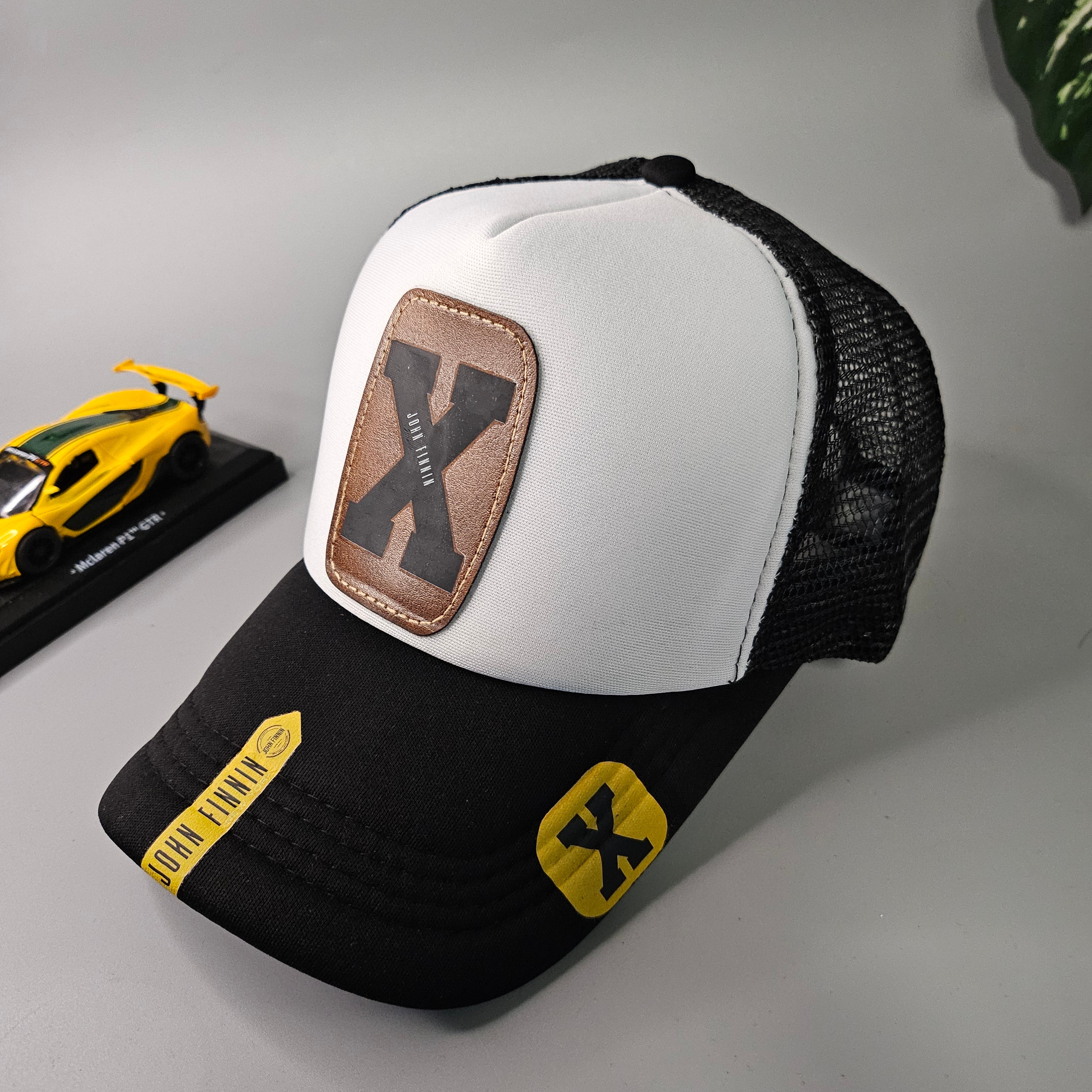 X 'JOHN FINNIN TRUCKER