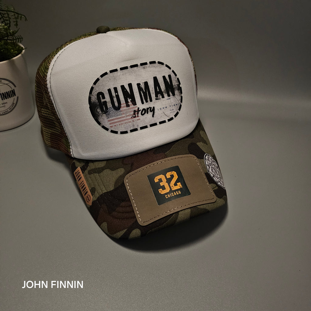 Trucker hat by John finnin high crown