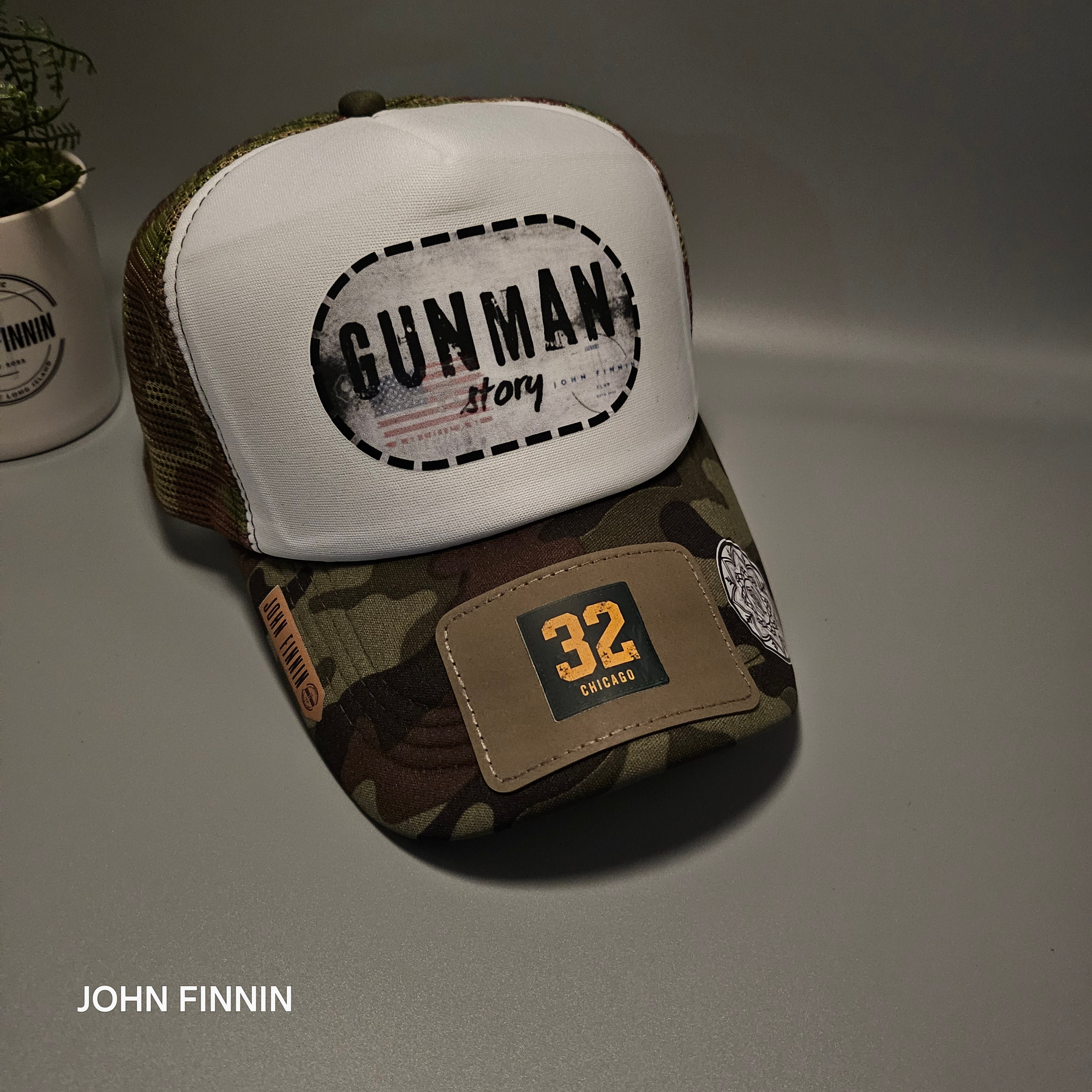 Trucker hat by John finnin high crown