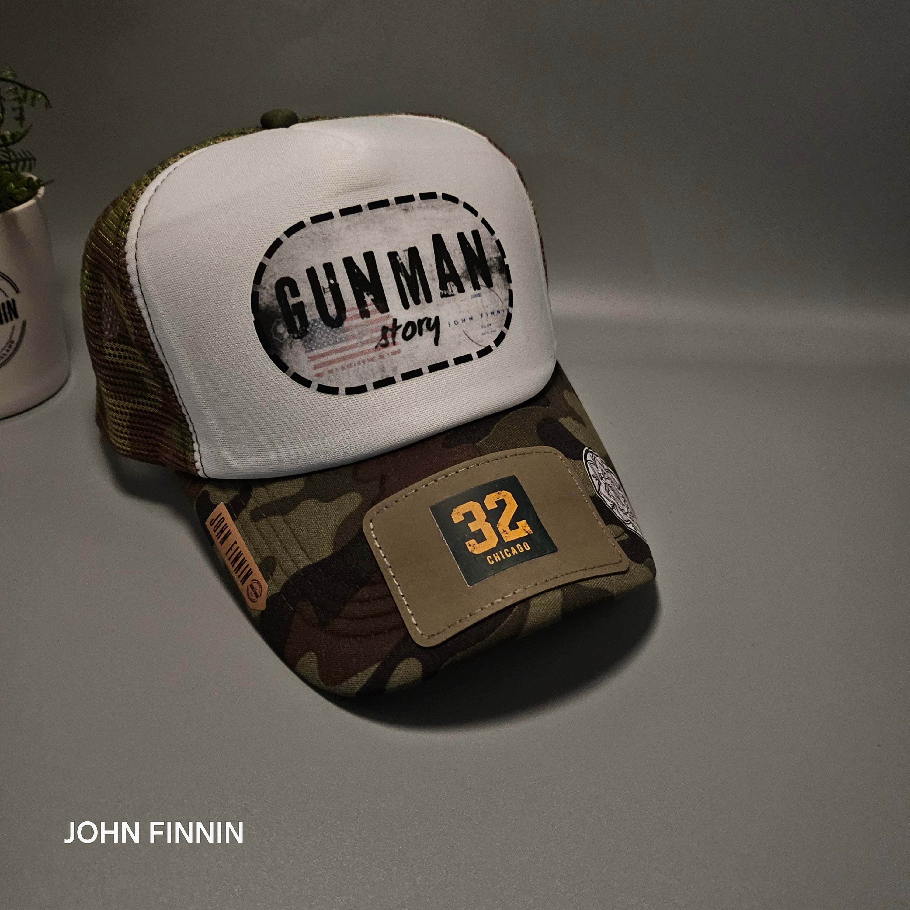 Trucker hat by John finnin high crown