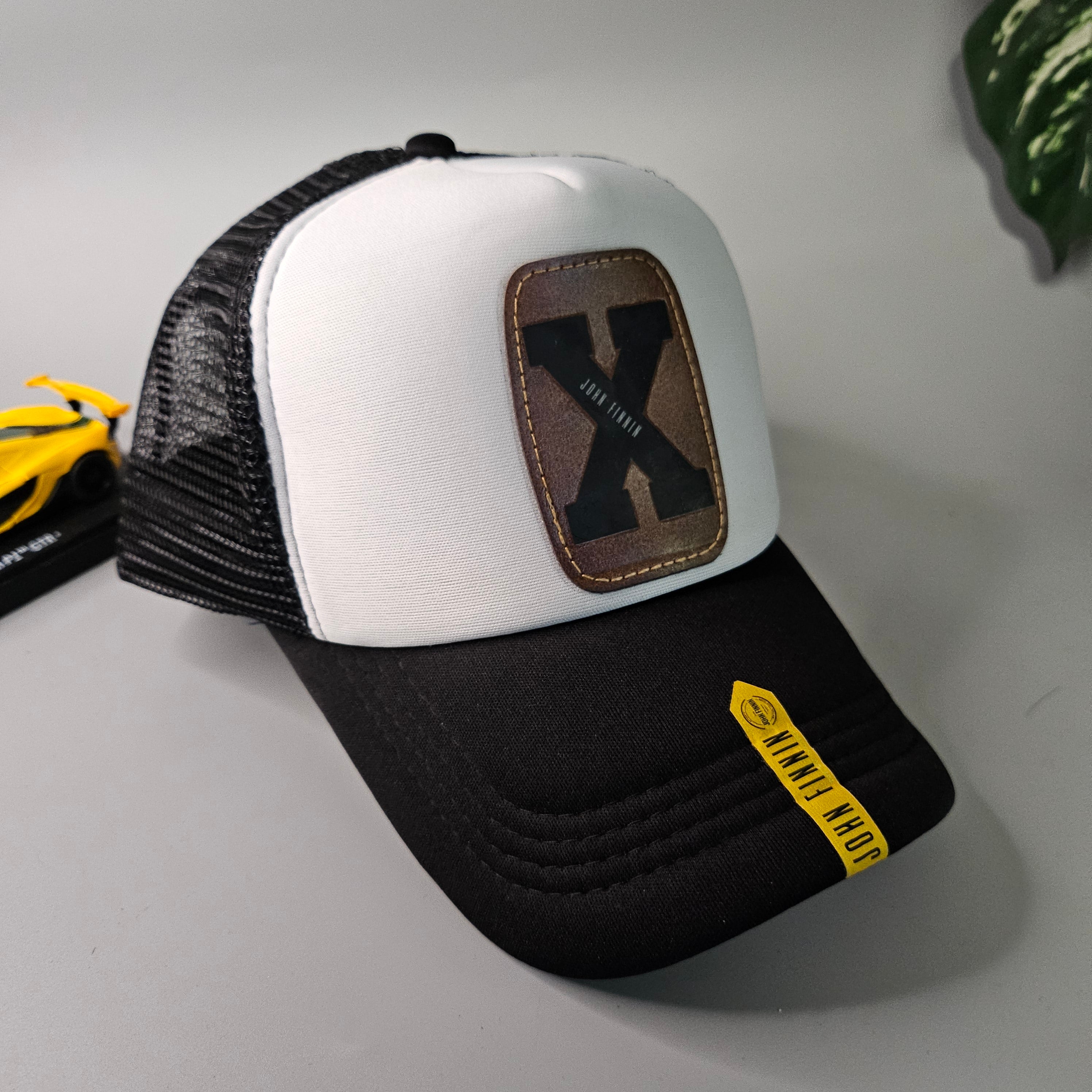 X 'JOHN FINNIN TRUCKER